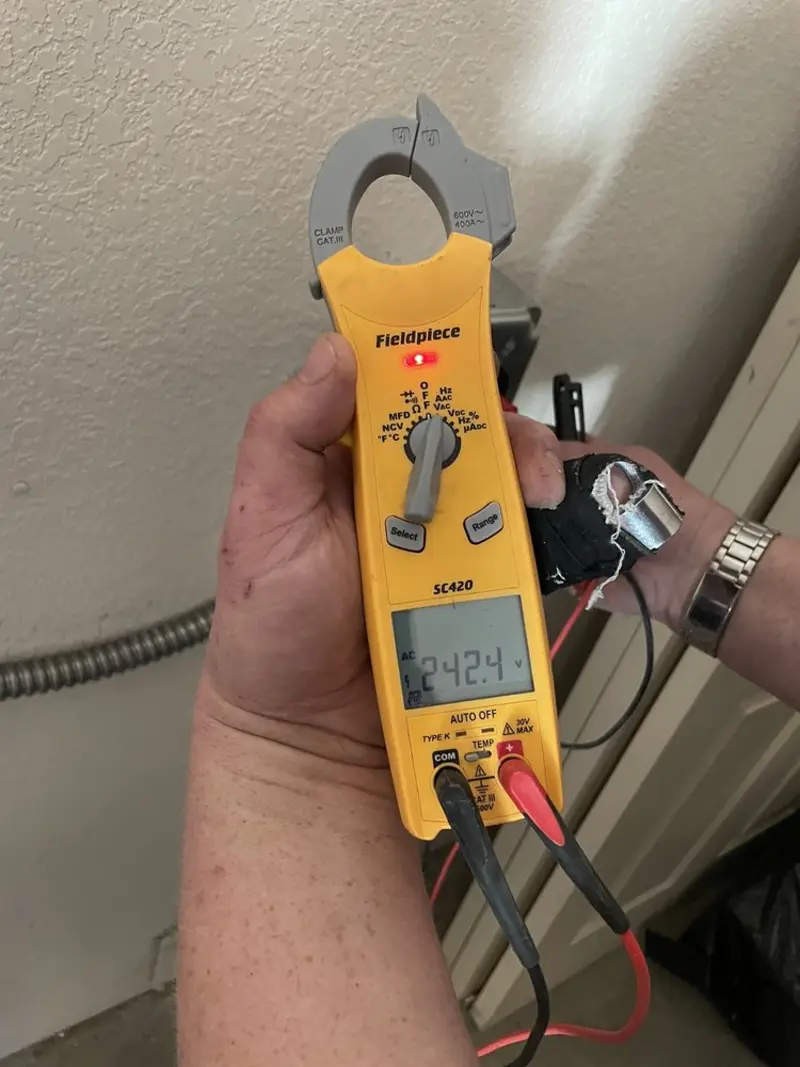 Voltage testing with clamp meter during Generator Installation in Fort Washington
